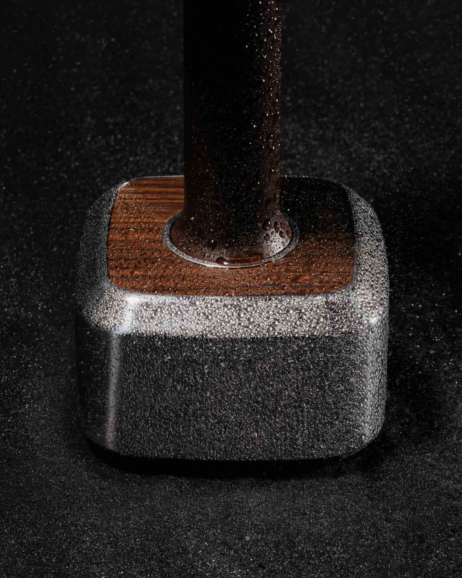 Macro of an Alama freeweight surface, light catching machined steel.